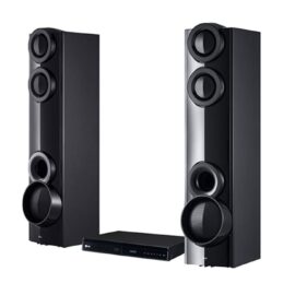 LG LHD675BG tower speakers standing either side of the black DVD main unit