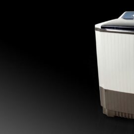 LG P1561RWNT twin tub washing machine in cream with a brown lower body, viewed from the front at an angle