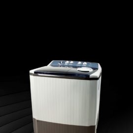 LG twin tub washing machine in white with a brown lower panel, dark tinted lids and five control dials on the top panel