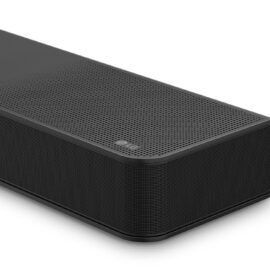 Angled view of the black LG soundbar's end, showing the perforated grille wrapping over the top and front with a small LG logo