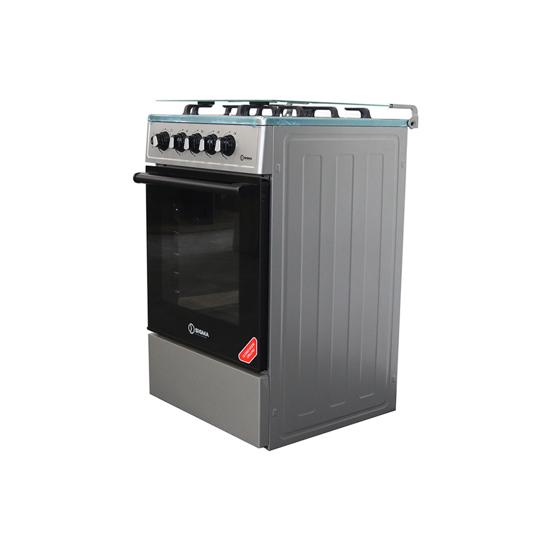 Grey Sigma free standing cooker seen from the front left, glass lid raised, cast iron pan supports on the hob and a black glass oven door