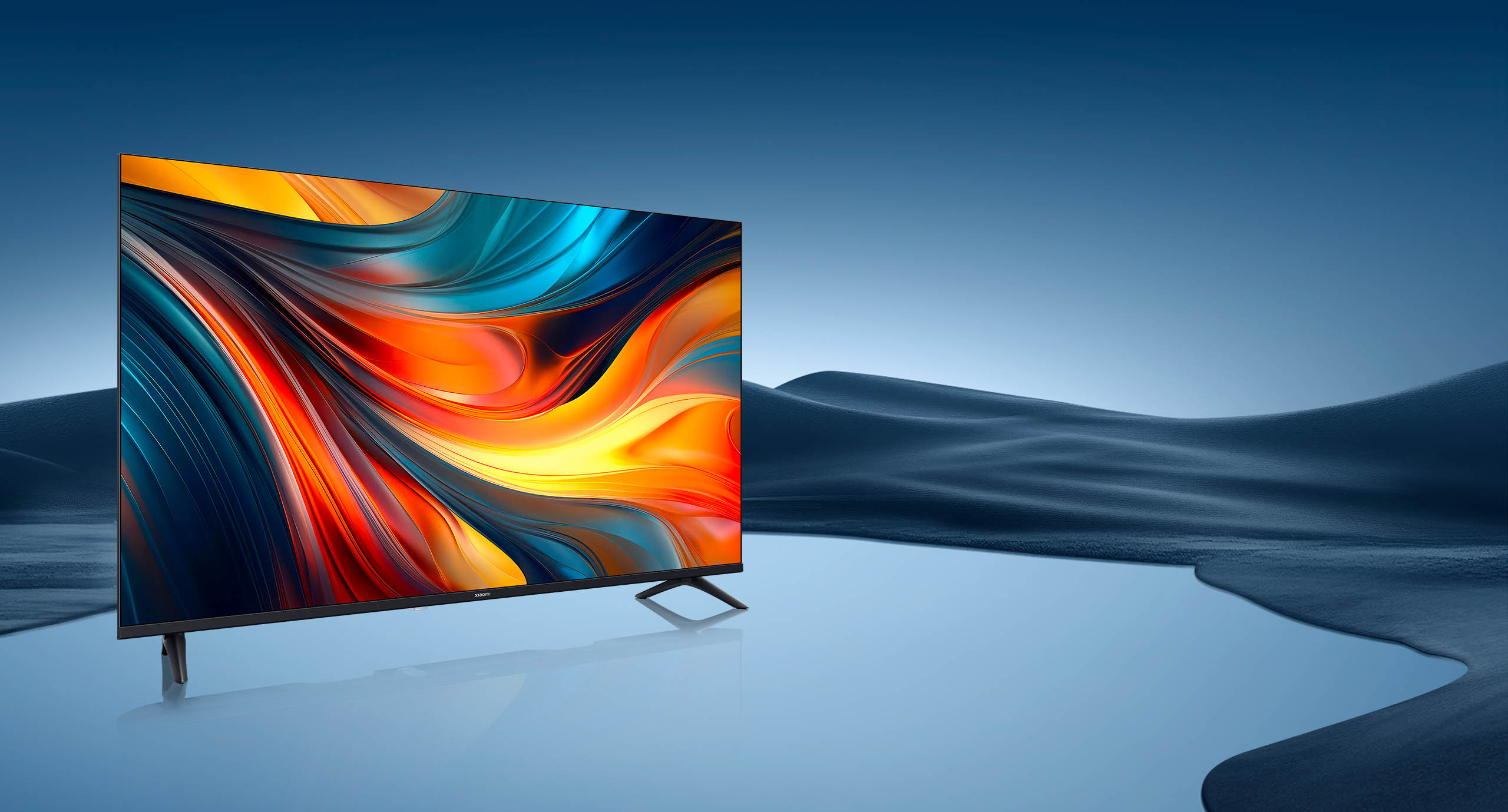 The Xiaomi TV A 43 FHD 2026 in a calm blue landscape setting