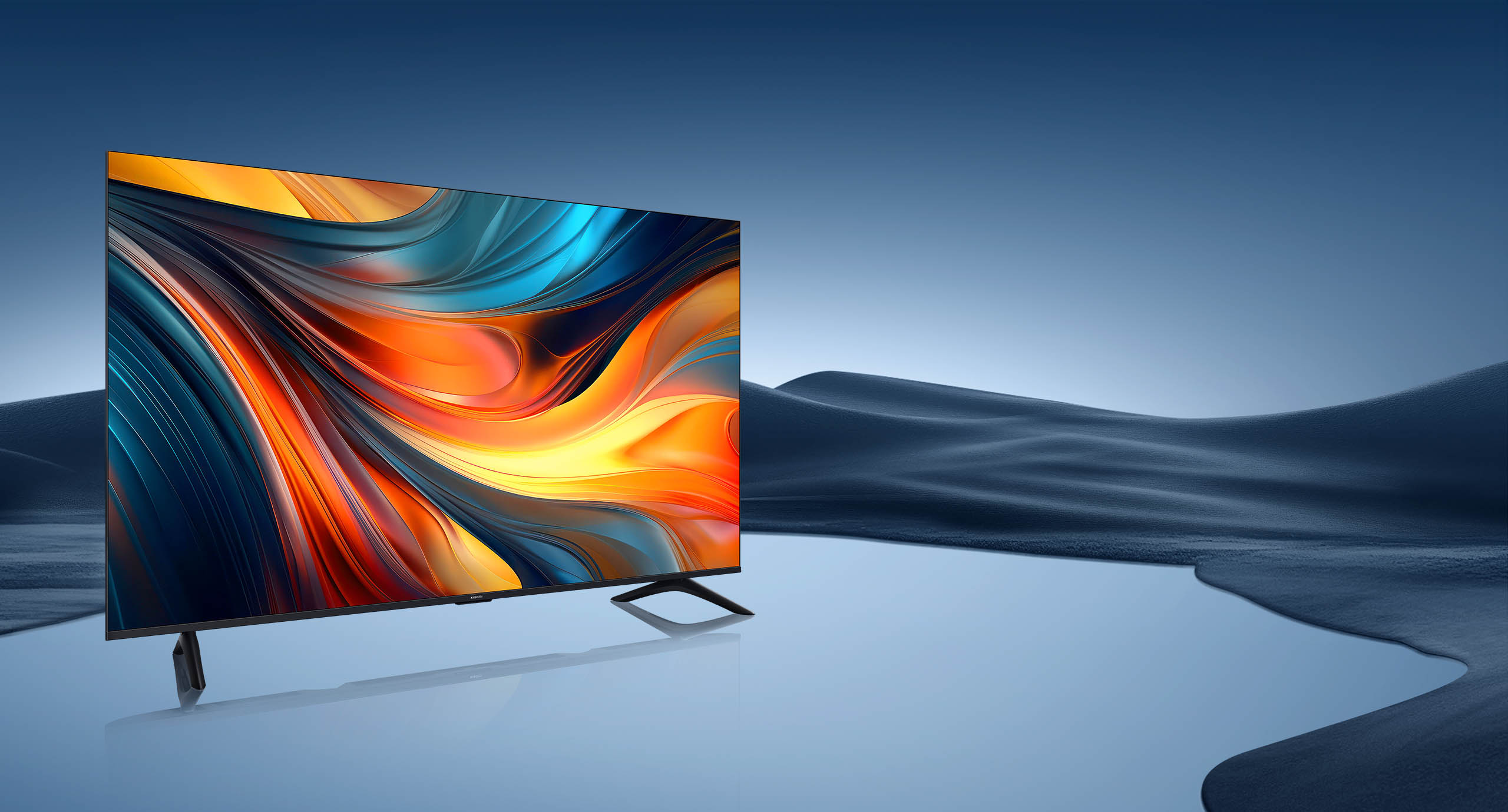 The Xiaomi TV A 65 2026 in a calm blue landscape setting